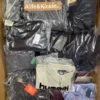 The photo shows a package with clothing in the category B.