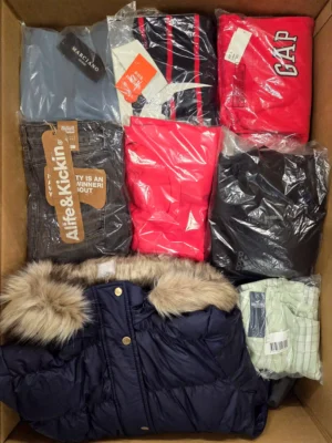 The photo shows a package with clothing in the category B.