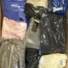 C2011 1 The photo shows a package with clothing in the category C.