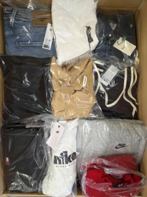 The photo shows a package with clothing in the category C.