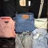 The photo shows a package with clothing in the category U.