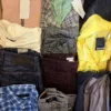 The photo shows a package with clothing in the category U.