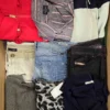The photo shows a package with clothing in the category U.