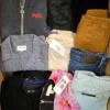 The photo shows a package with clothing in the category U.