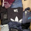 The photo shows a package with clothing in the category U.