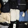 The photo shows a package with clothing in the category U.