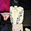 The photo shows a package with clothing in the category U.