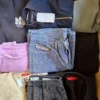 The photo shows a package with clothing in the category U.