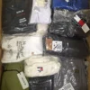 The photo shows a package with clothing in the category T.