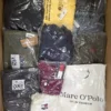 The photo shows a package with clothing in the category T.