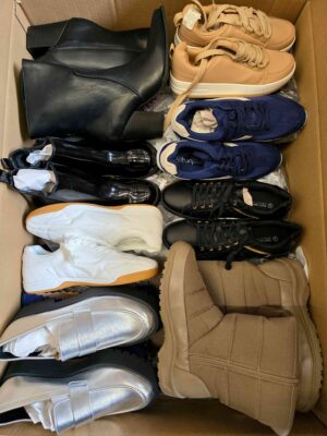 The photo shows a package with clothing in the category BPS.