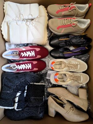 The photo shows a package with clothing in the category BPS.