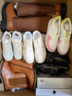 The photo shows a package with clothing in the category BPS.