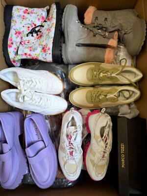 The photo shows a package with clothing in the category BPS.