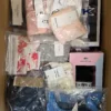 AU325 2 The photo shows a package with clothing in the category AU.