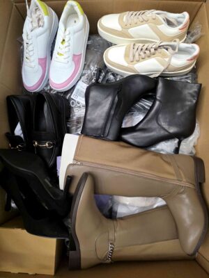 The photo shows a package with clothing in the category BPS.