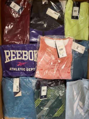 The photo shows a package with clothing in the category R.