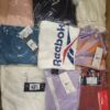 The photo shows a package with clothing in the category R.