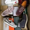 The photo shows a package with footwear in the category BS.