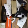 The photo shows a package with footwear in the category BS.