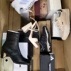 The photo shows a package with footwear in the category BS.