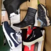The photo shows a package with footwear in the category BS.