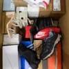 The photo shows a package with footwear in the category BS.