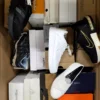 The photo shows a package with footwear in the category BS.