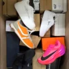The photo shows a package with footwear in the category BS.