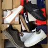 The photo shows a package with footwear in the category BS.