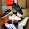 The photo shows a package with footwear in the category BS.