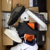 The photo shows a package with footwear in the category BS.