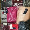 The photo shows a package with clothing in the category R.