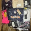 The photo shows a package with clothing in the category K.