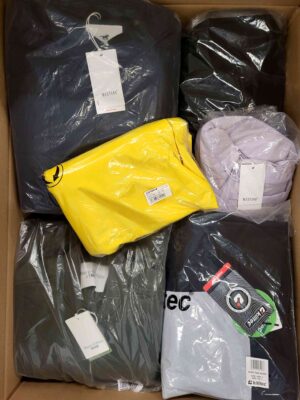 The photo shows a package with clothing in the category AJS.