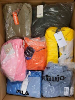 The photo shows a package with clothing in the category AJS.