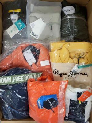 The photo shows a package with clothing in the category AJS.
