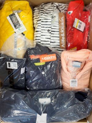 The photo shows a package with clothing in the category AJS.
