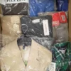 The photo shows a package with clothing in the category AM.