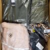 AJW673 1 The photo shows a package with clothing in the category AJW.