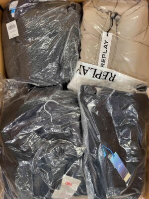 The photo shows a package with clothing in the category AJW.