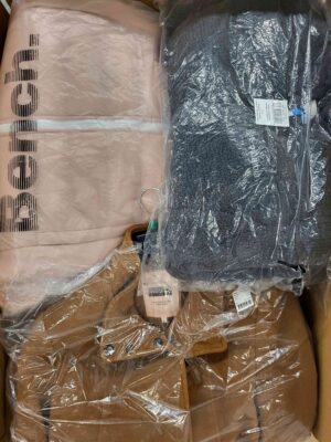 The photo shows a package with clothing in the category AJW.