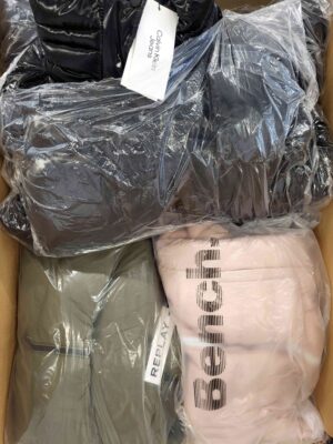 The photo shows a package with clothing in the category AJW.