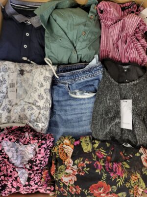 The photo shows a package with clothing in the category TSC.