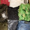 The photo shows a package with clothing in the category TSC.