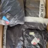 AJW792 2 The photo shows a package with clothing in the category AJW.